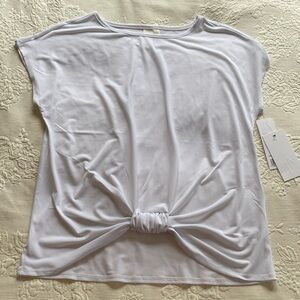 ady p white polyester top with scrunched hemline accent. New with tags